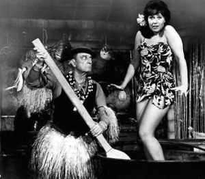 Buster Keaton made appearances in several AIP beach party films, seen here in Tiki attire to match his famous porkpie hat. Remember, it doesn't need to make sense- it's nonsensical fun!